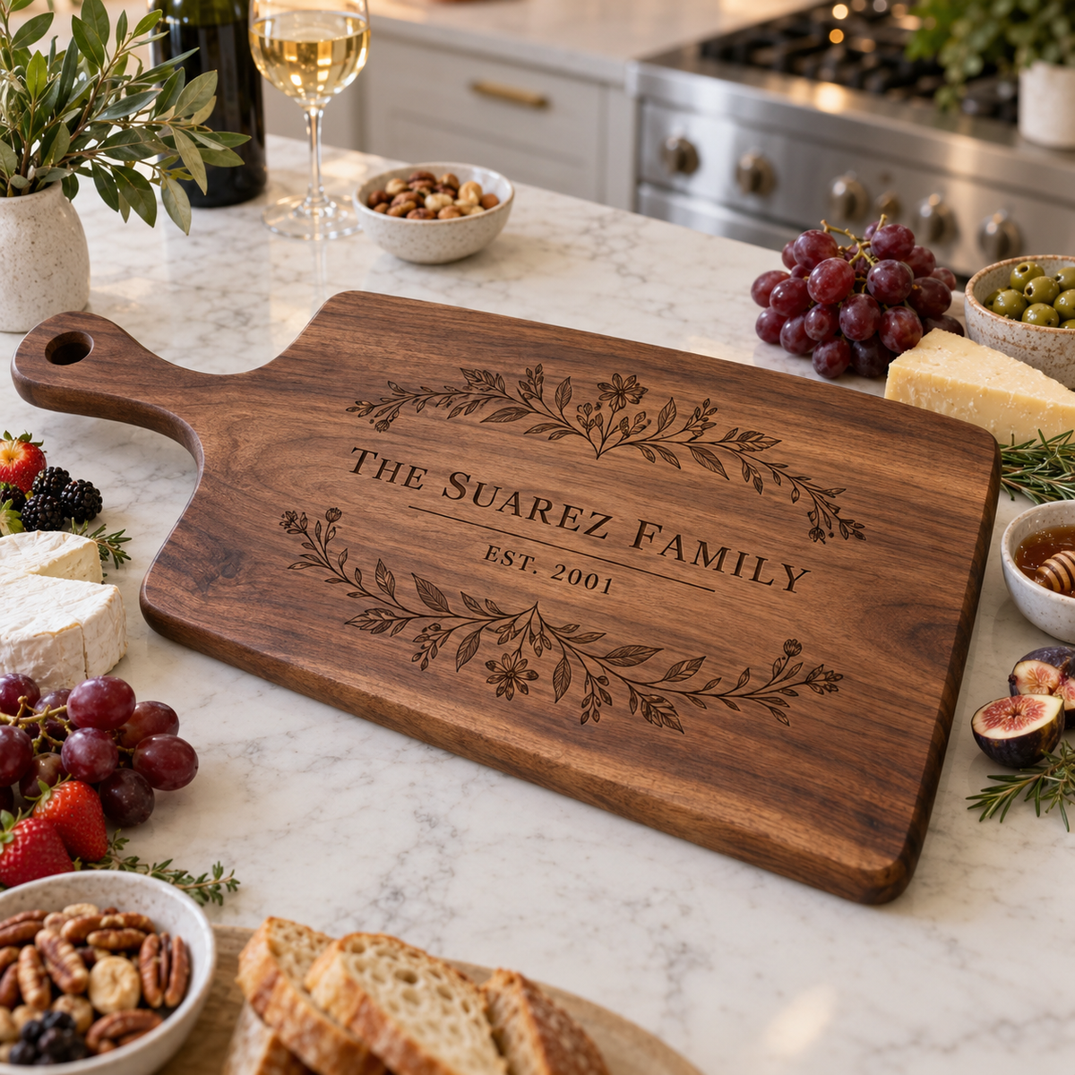 Personalized walnut charcuterie and cutting board engraved for the Suarez family
